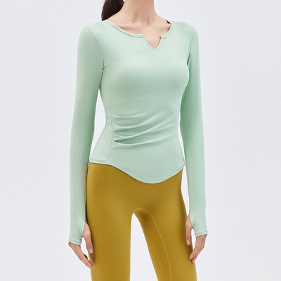 comprare Maglia da yoga a maniche lunghe da donna verde menta con fori per i pollici, vestibilità slim per allenamento online manufacture
