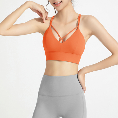 kaufen Crisscross-Front-Sport-BH für Damen, butterweiches Nylon-Spandex, geringer Halt für Yoga, Pilates und Alltag, leuchtend orange online manufacture